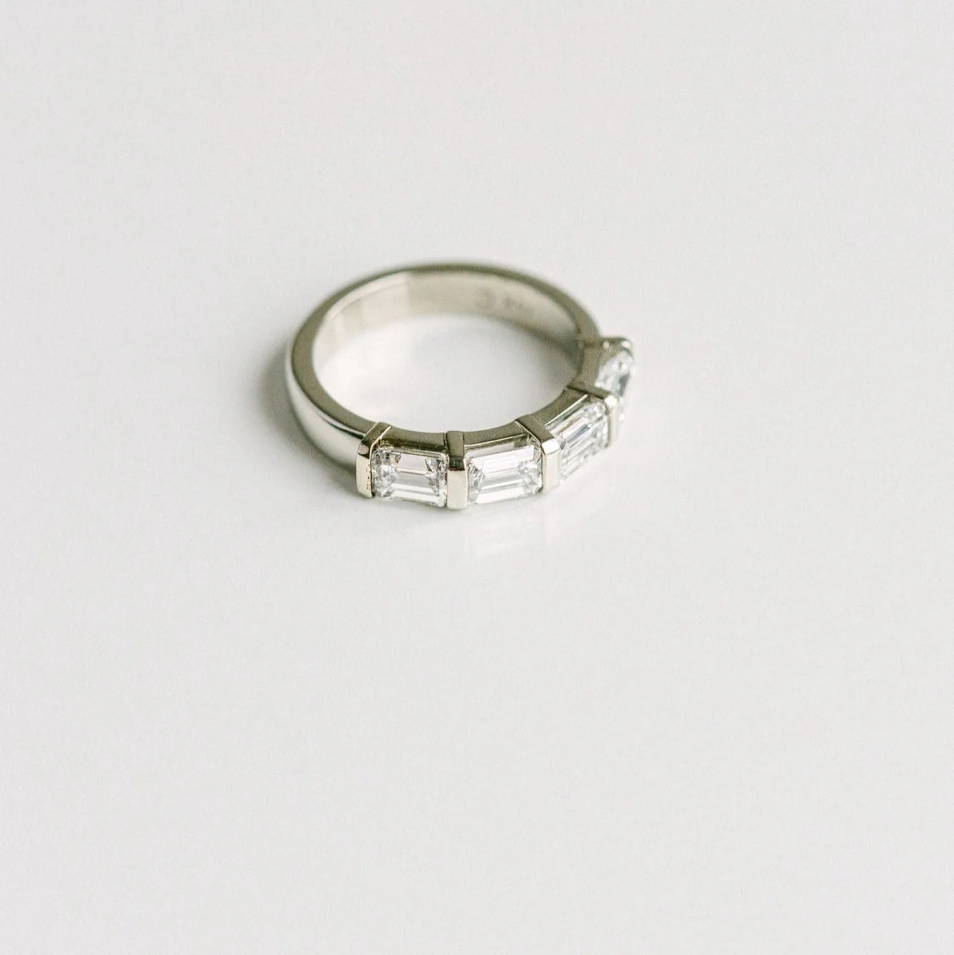 East-West Set Emerald Cut Diamond Band - Image 4
